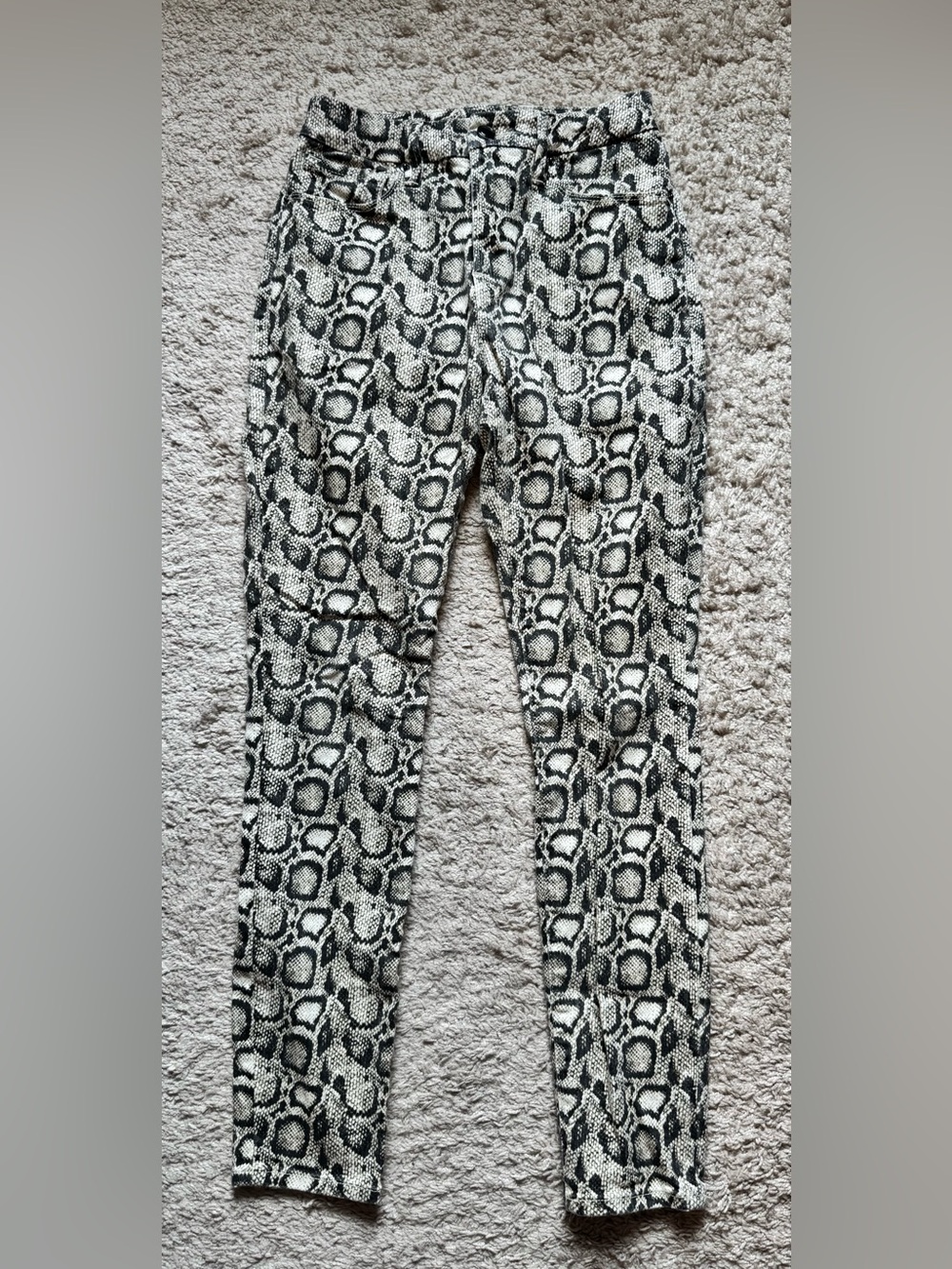 Good American brown and cream snake print jeans